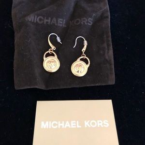 Michael Kors Authentic Logo Earrings in Gold tone.